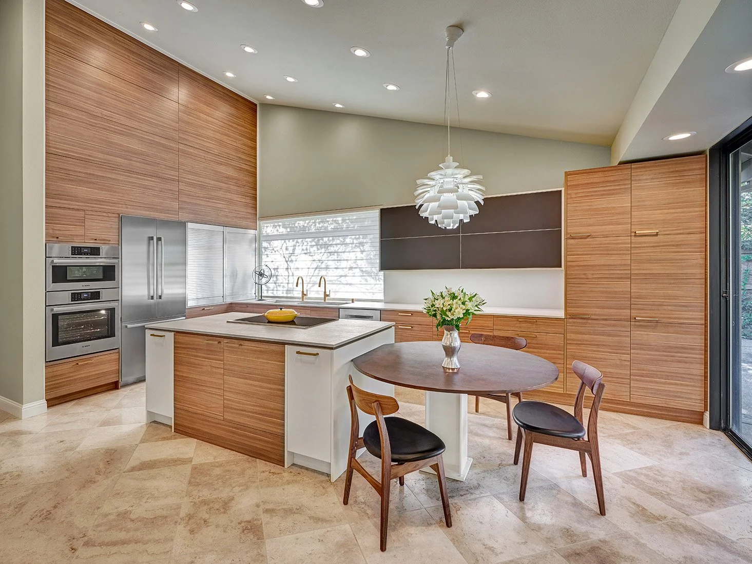 Vaulted ceiling kitchen remodel, wood European cabinetry, tall appliance wall, appliance garage, large island