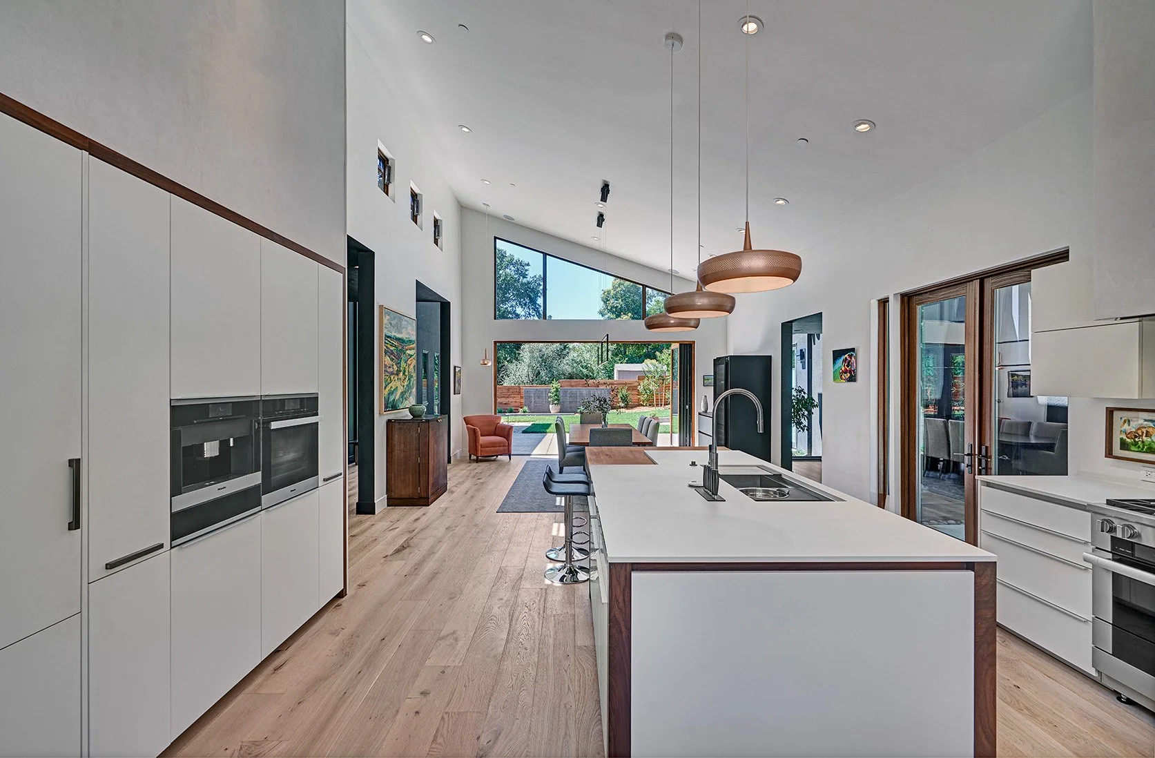 Modern home remodel, vaulted kitchen, view to backyard