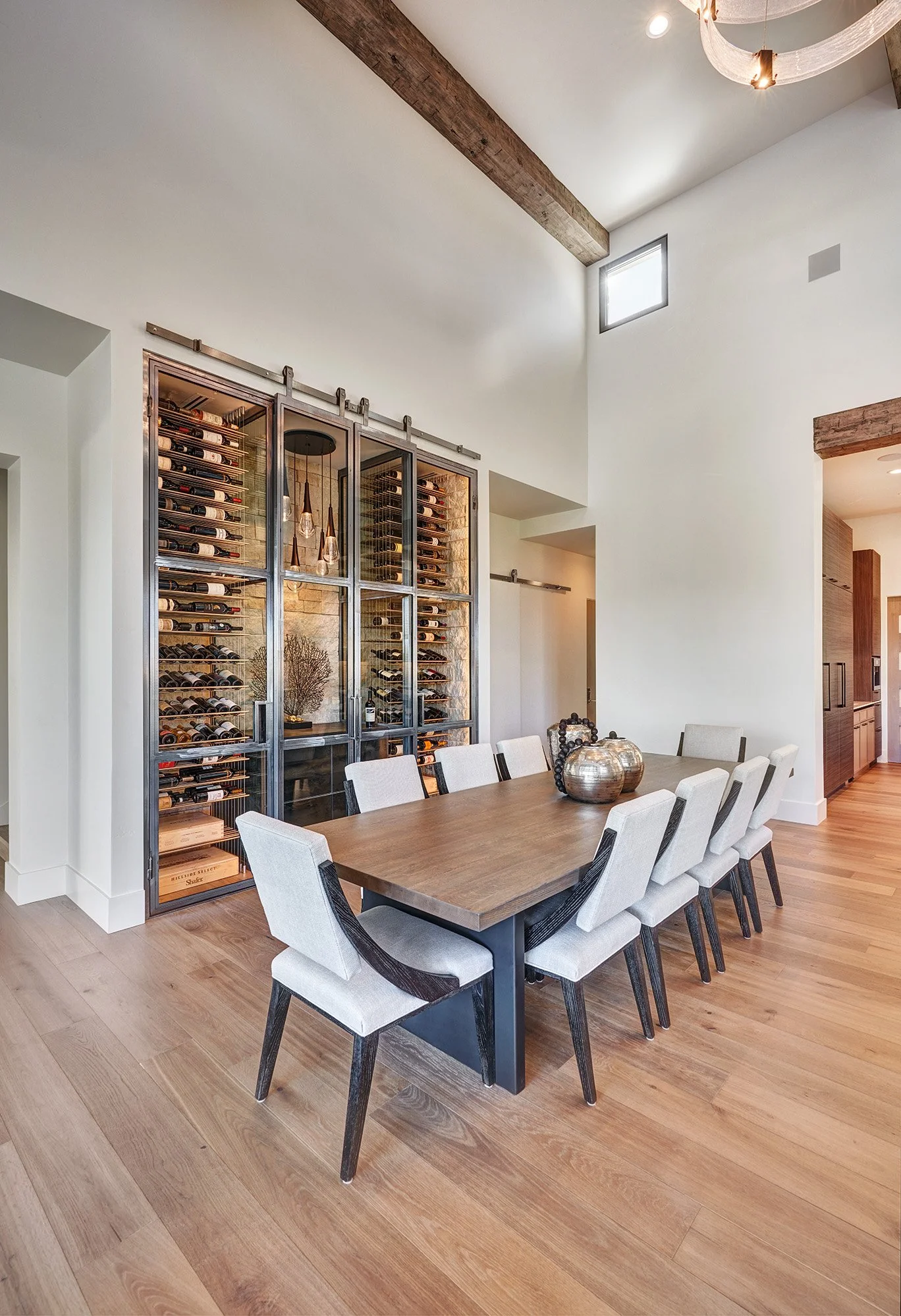 Modern new construction home, large dining table, wine room