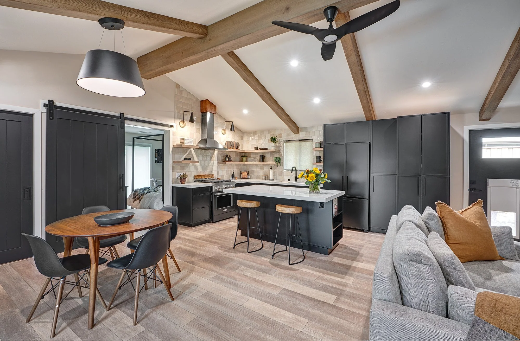 New construction ADU, kitchen with micro shaker cabinetry, island, beams