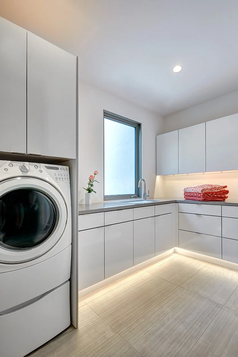 Modern new construction home, European cabinetry, laundry room