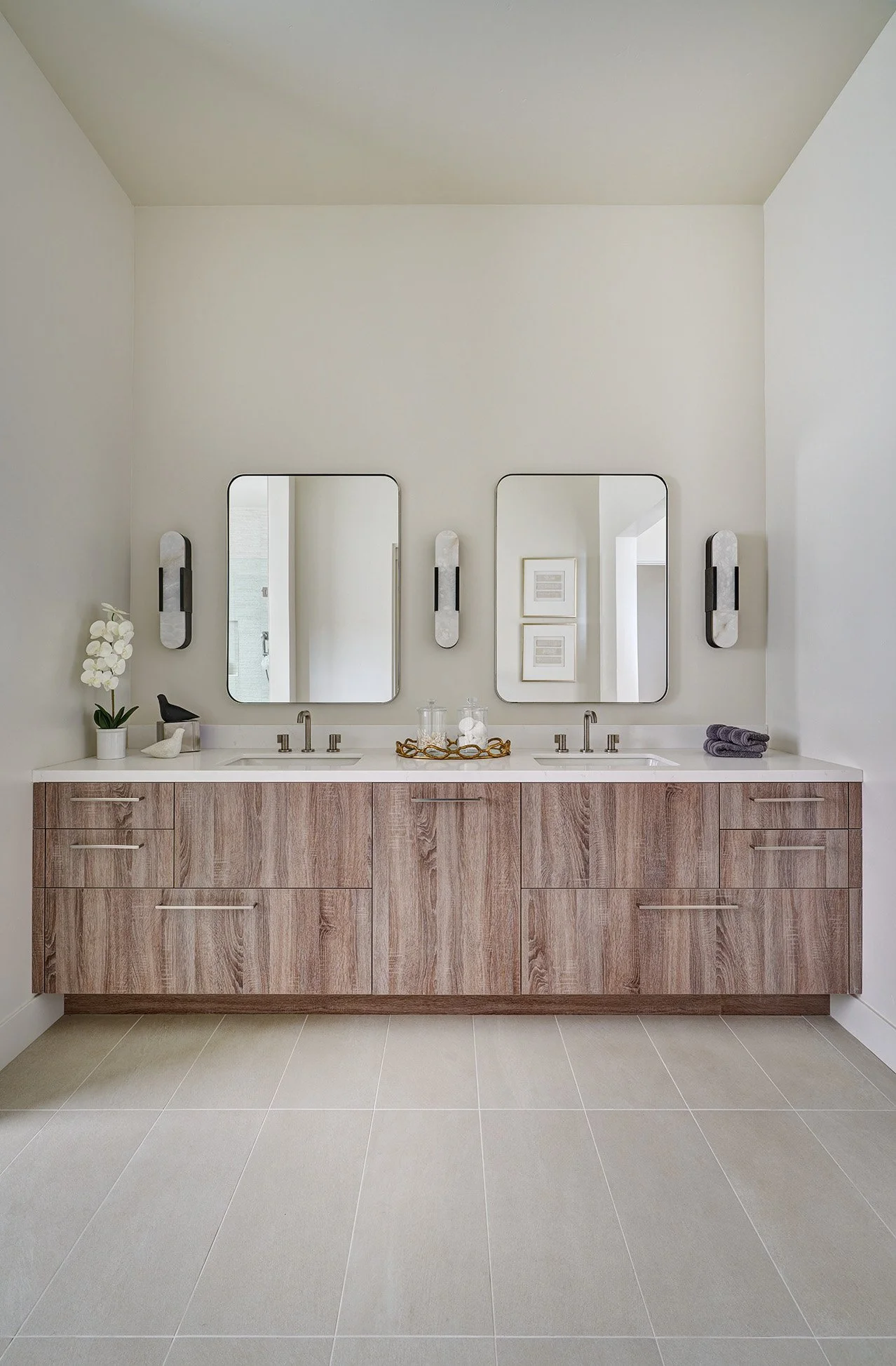 Modern new construction home, European laminate cabinetry, vanity cabinet in primary bathroom