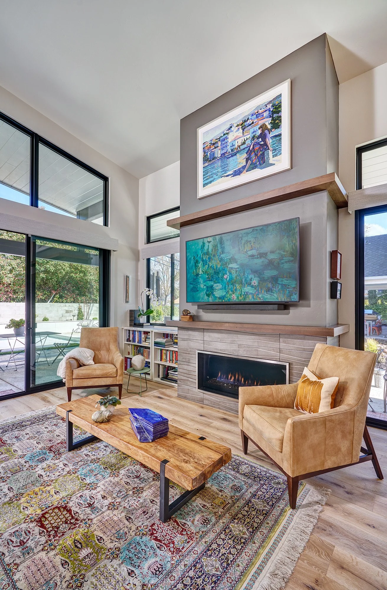 New construction ADU home, tall fireplace structure, wood cabinet mantle and shelf, linear fireplace