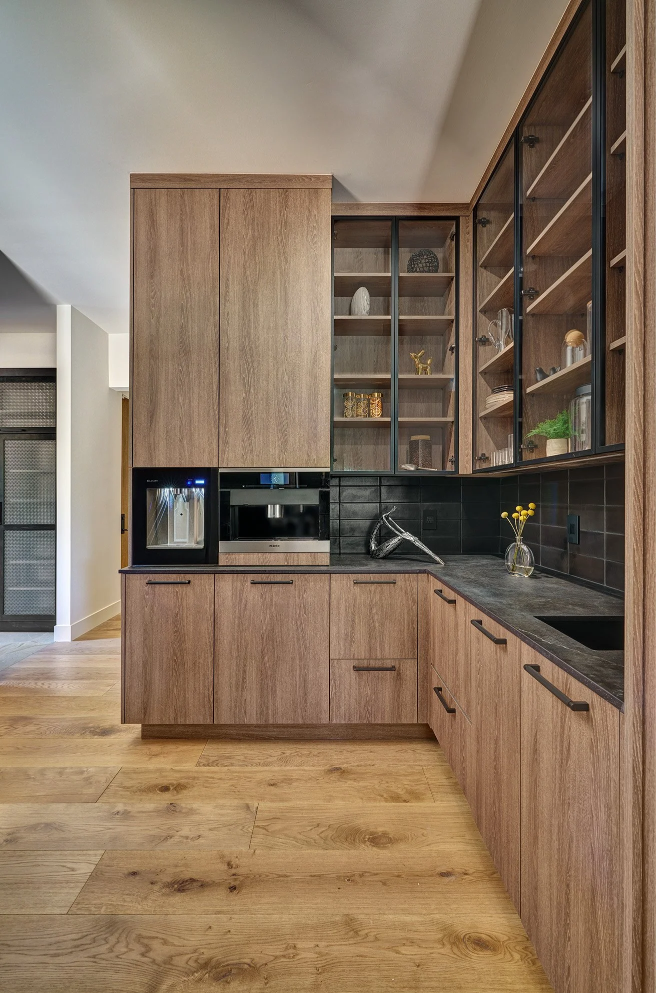 Modern new construction kitchen, European cabinetry, modern appliances, glass cabinets