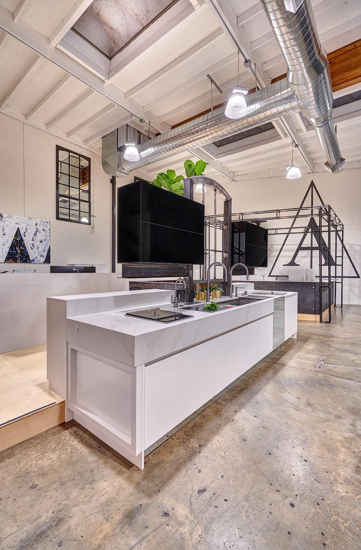 Interior design firm, showroom kitchen, European cabinetry, large beams, Sub-Zero, Wolf + appliances, The Galley workstation, appliance garage