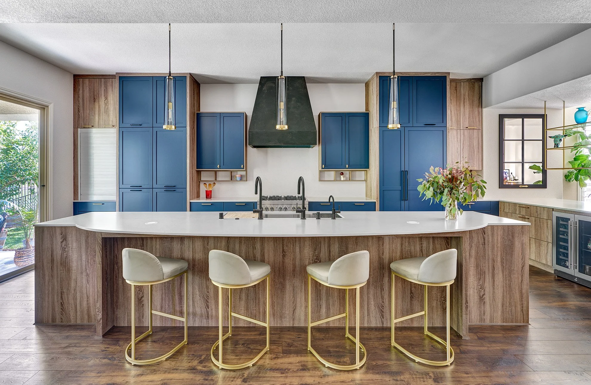 Kitchen remodel, blue + wood laminate cabinets, large seating island, appliance garage