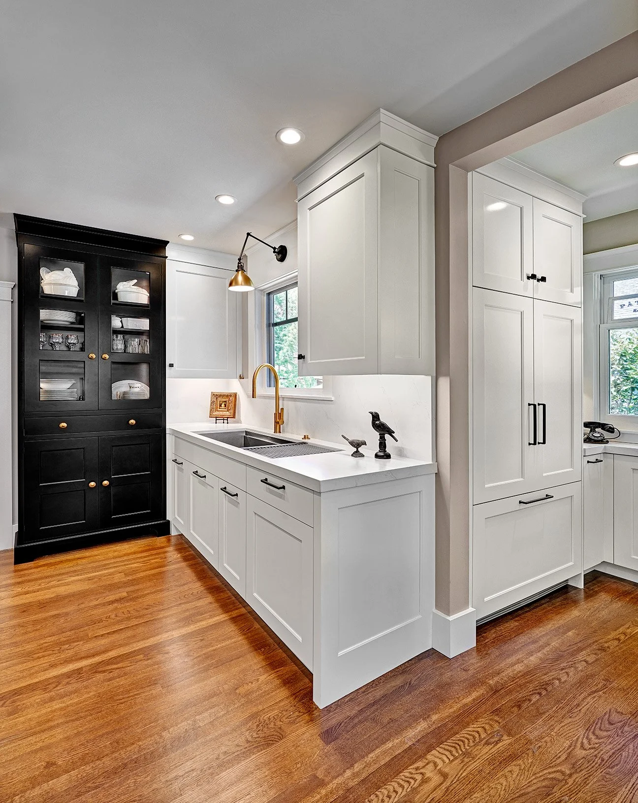 Transitional black + white kitchen remodel, The Galley workstation, cabinet hutch, baking station