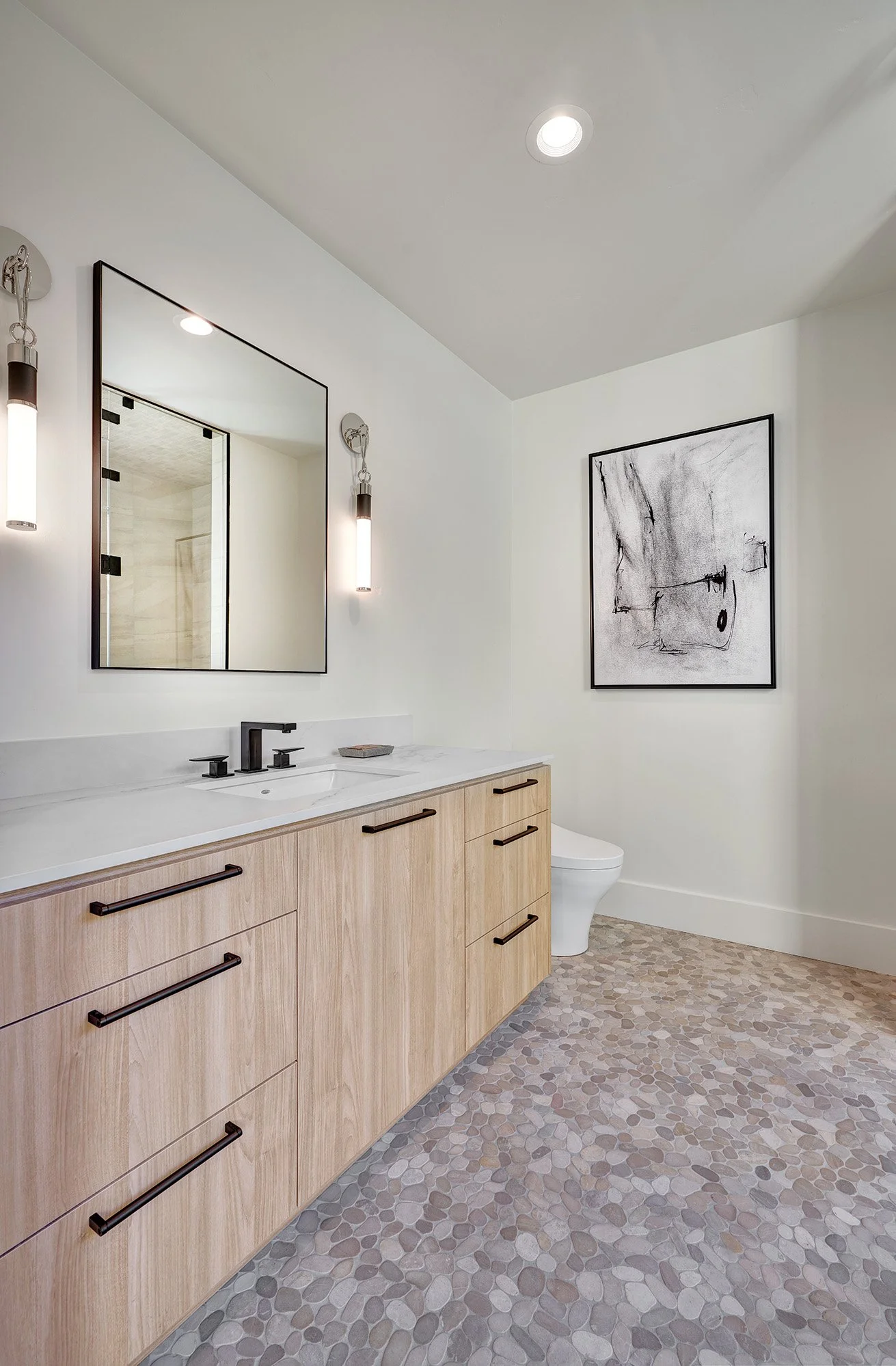 Modern new construction home, laminate cabinetry, guest bath