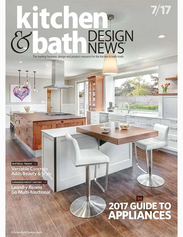 Cover of Kitchen & Bath Design News magazine, July 2017 issue, featuring a modern kitchen with an island, white cabinets, wooden accents, and a dining area.