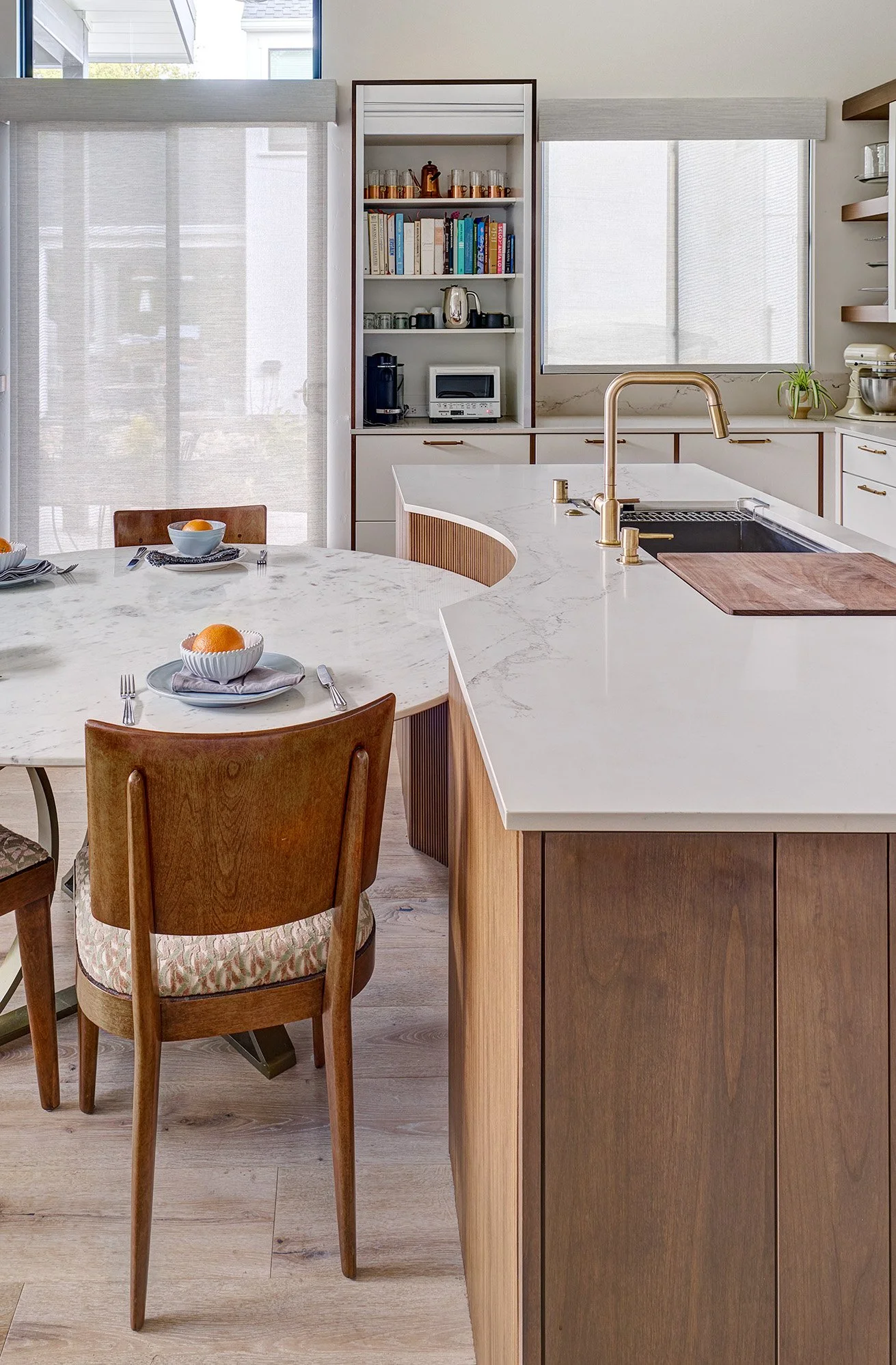 New construction ADU home, white + wood kitchen, curved ribbed island, appliance garage