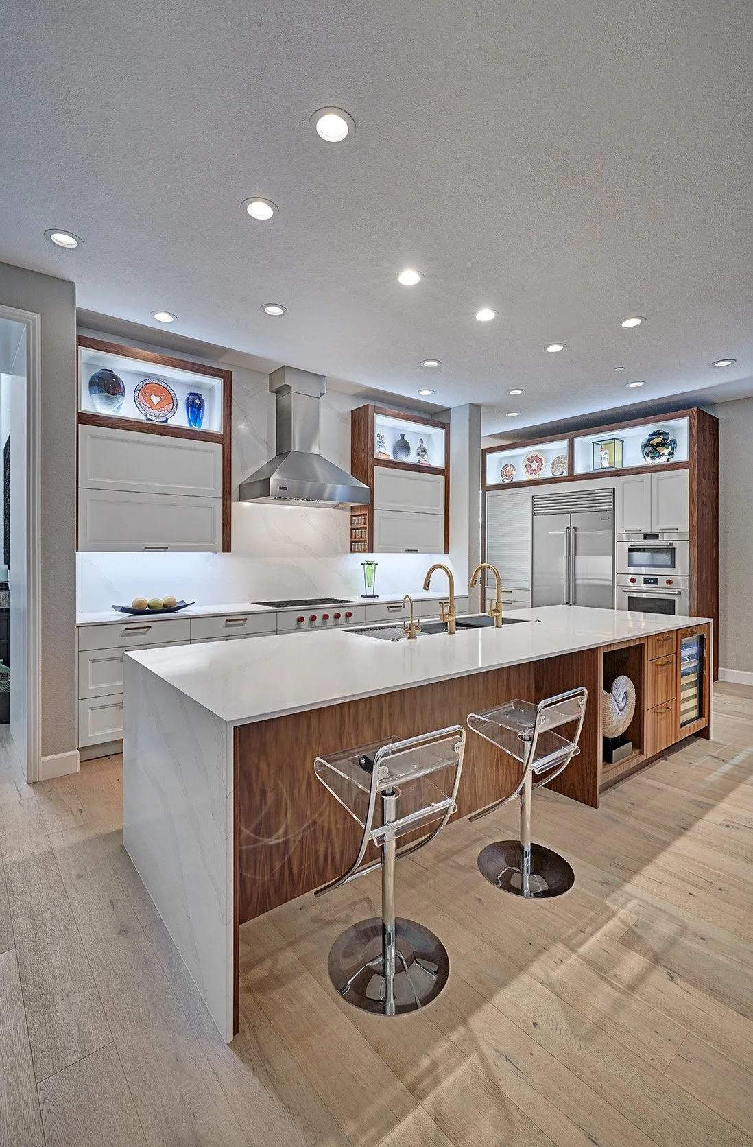 Modern kitchen remodel, white + walnut cabinetry, large seating island, workstation sink