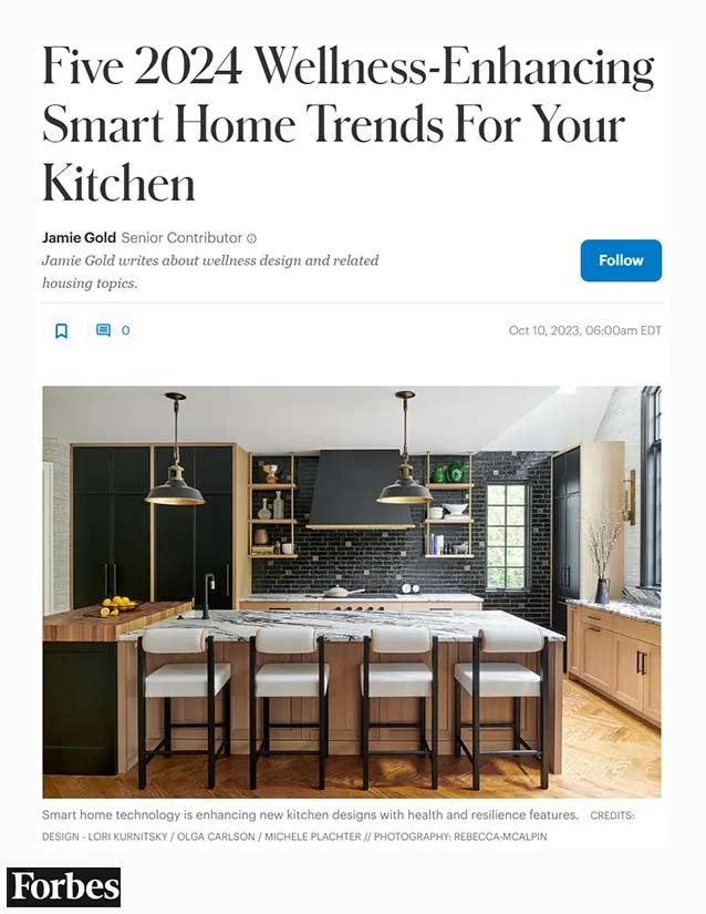 A modern kitchen with an island, four white barstools, black and wood cabinetry, open shelves, pendant lighting, a window, and black backsplash tiles.