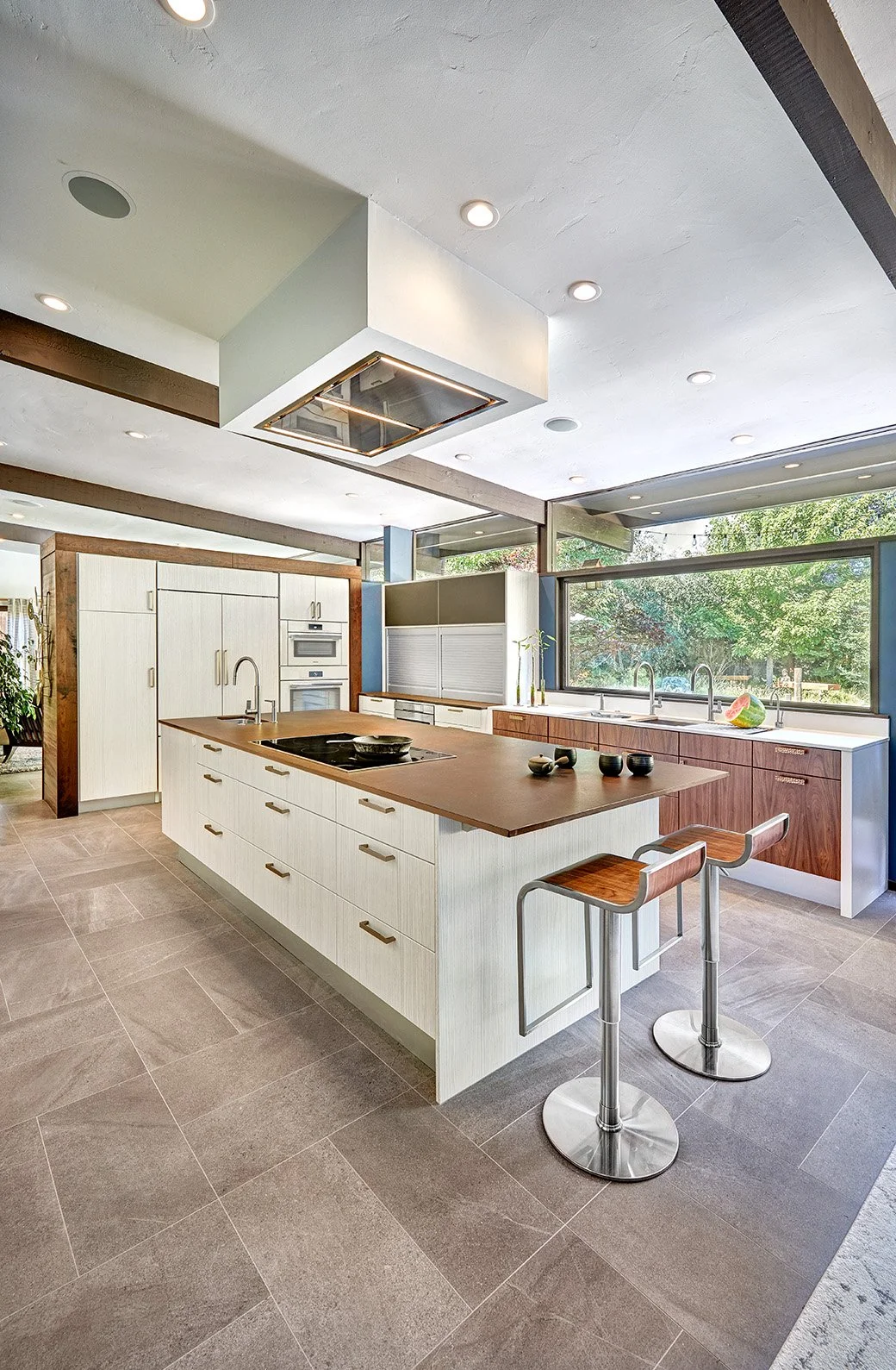 Mid-Century Modern kitchen remodel, Streng home, white + wood cabinetry, waterfall countertop, appliance garage, large island