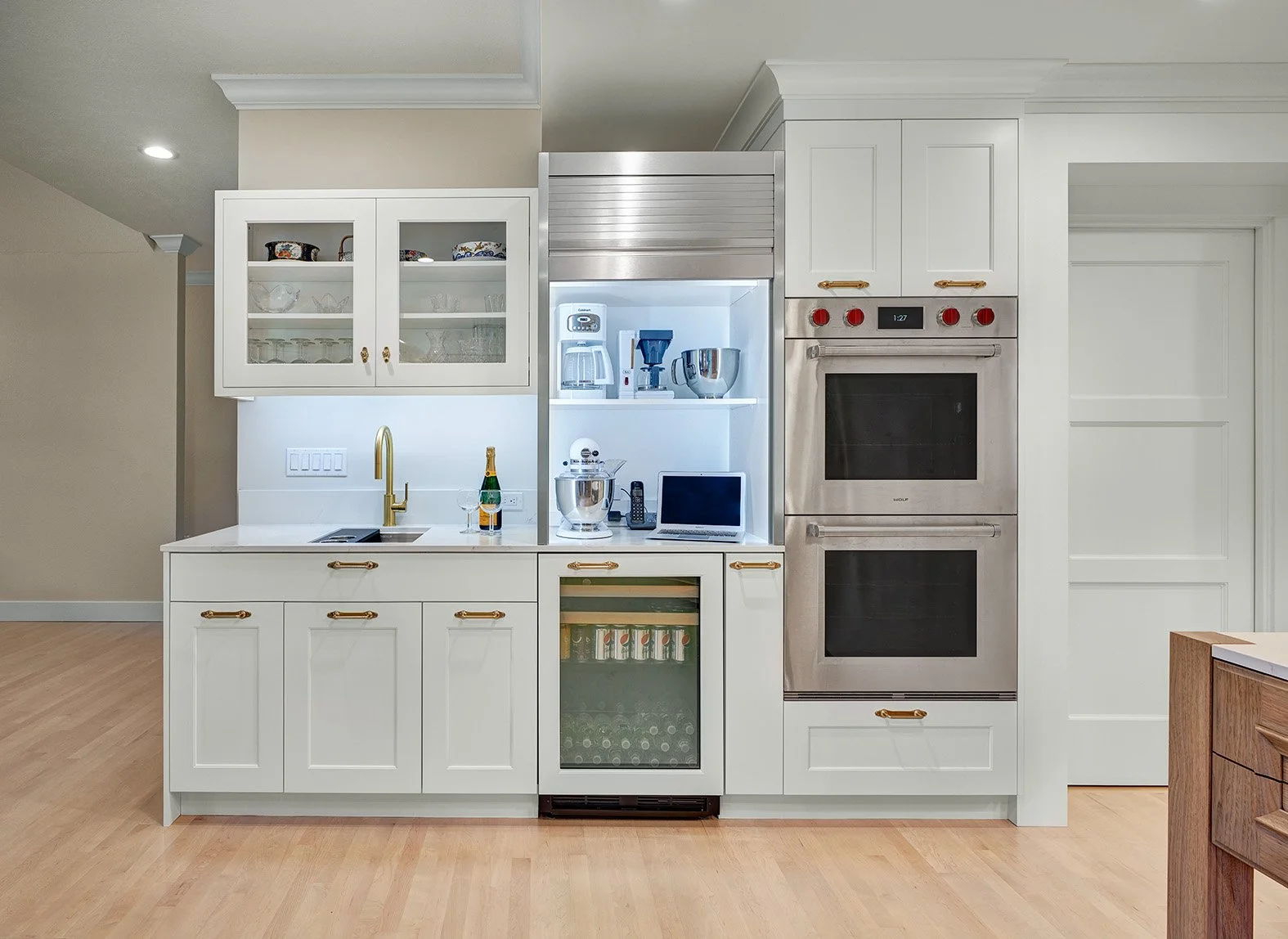 Home remodel, warm contemporary kitchen, hickory and white cabinetry, Sub-Zero Wolf appliances, beverage center, appliance garage
