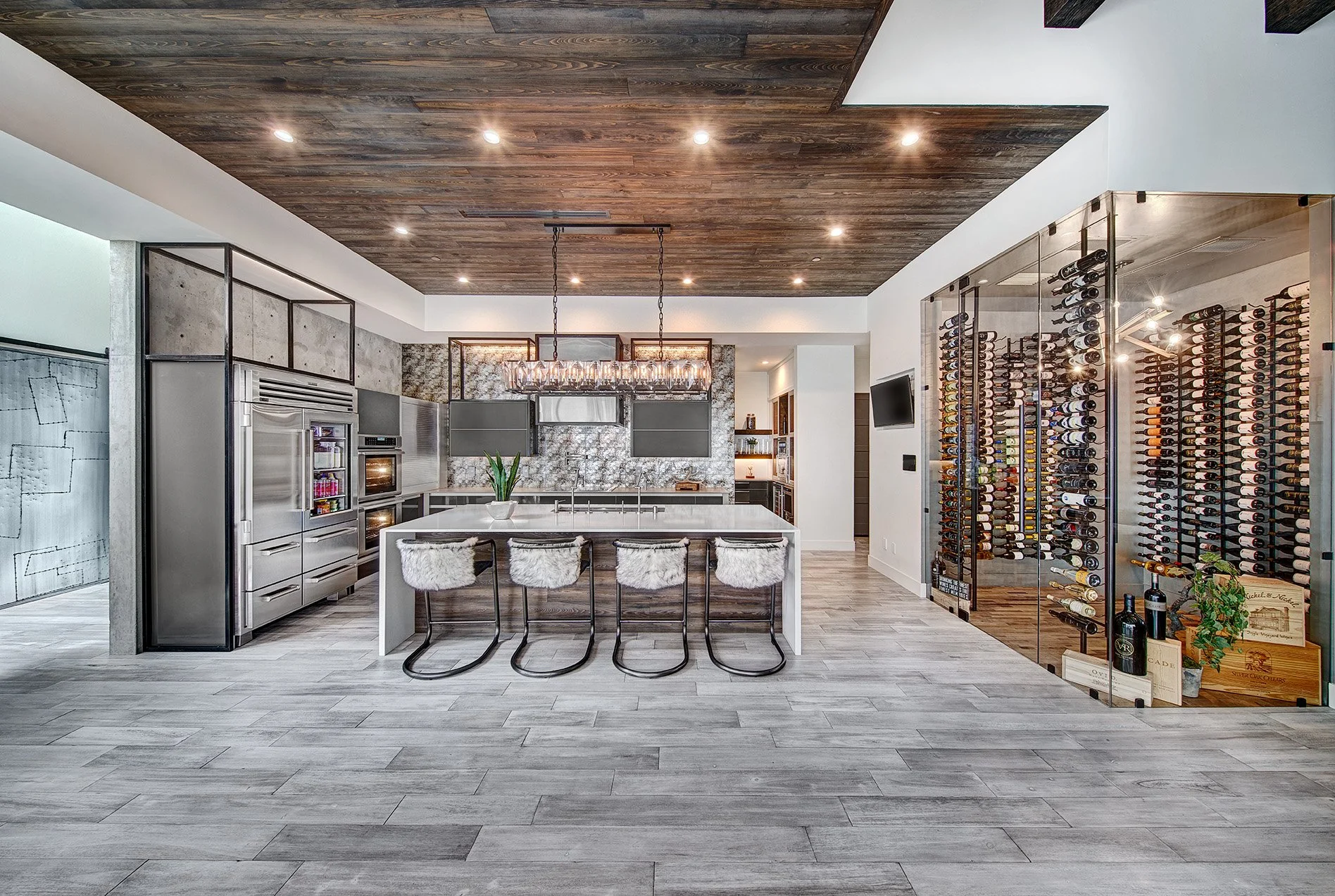 Luxury new construction home, glamorous kitchen, wine cellar, metal frame cabinets, professional appliances