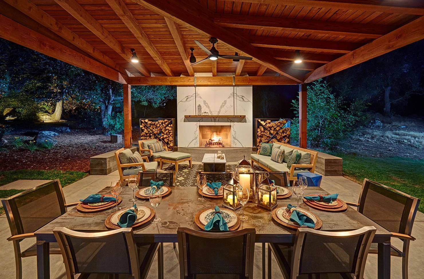 Whole home remodel, modern industrial outdoor lounge with Dekton clad fireplace