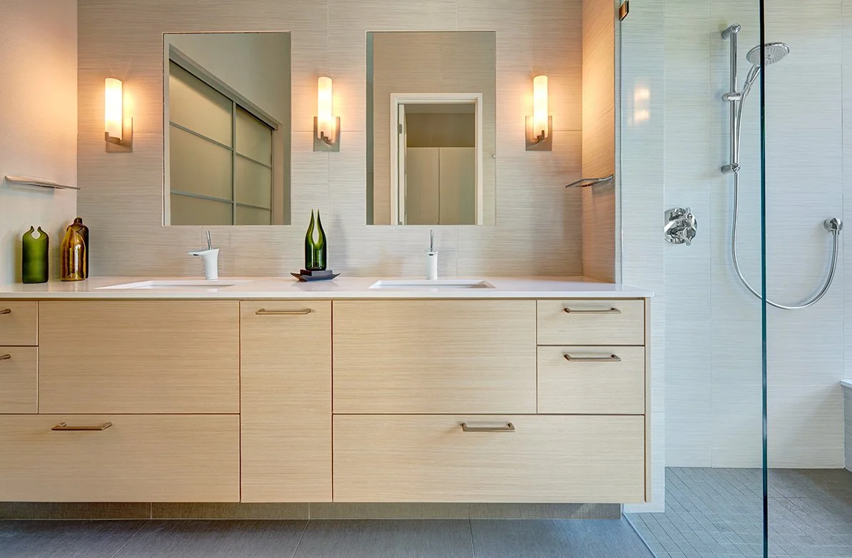 Primary bath remodel, European cabinet vanity, flush mirrors, tile splash, frameless glass shower
