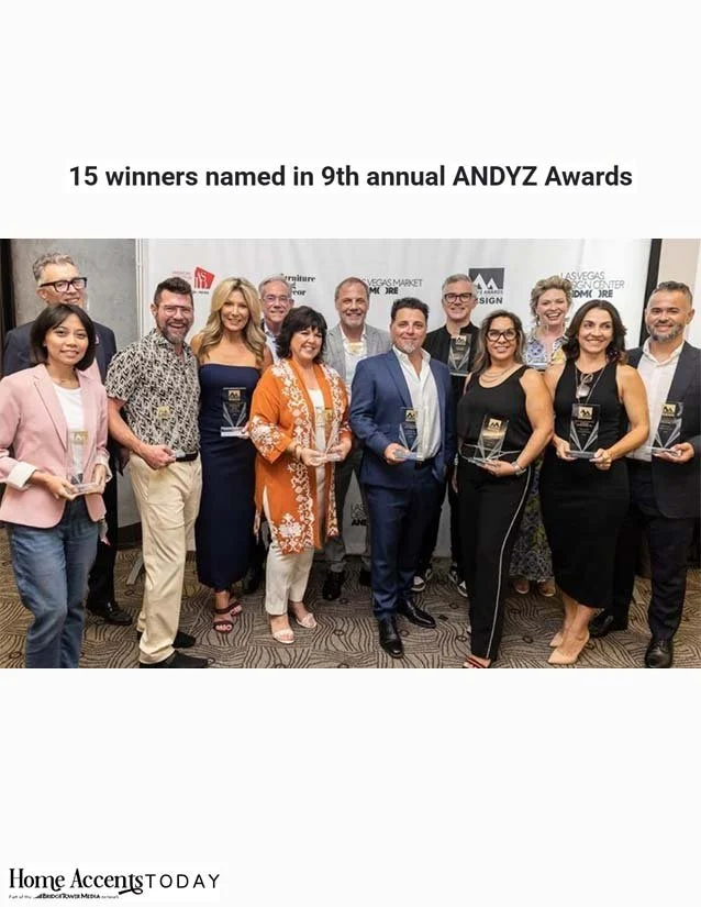 Group of 15 people posing with awards at the 9th annual ANDYZ Awards event