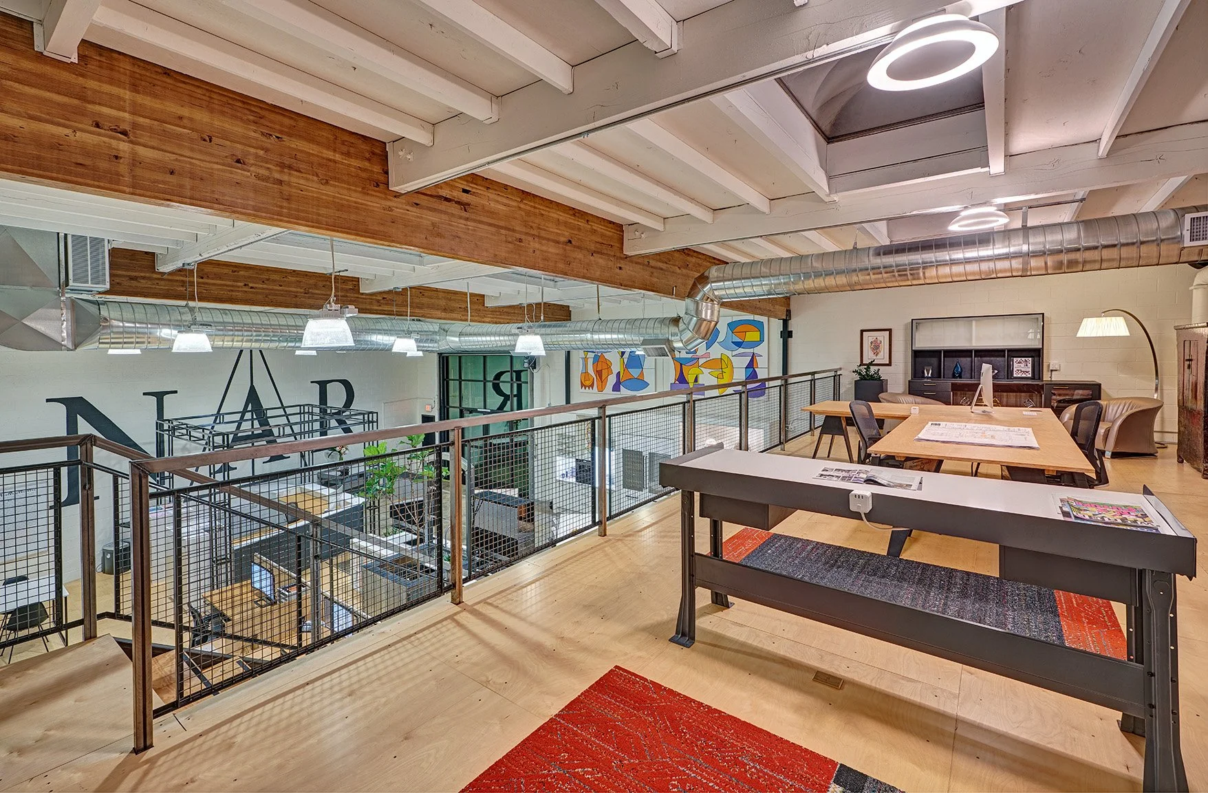 Interior design firm, mezzanine, desks, worksurfaces