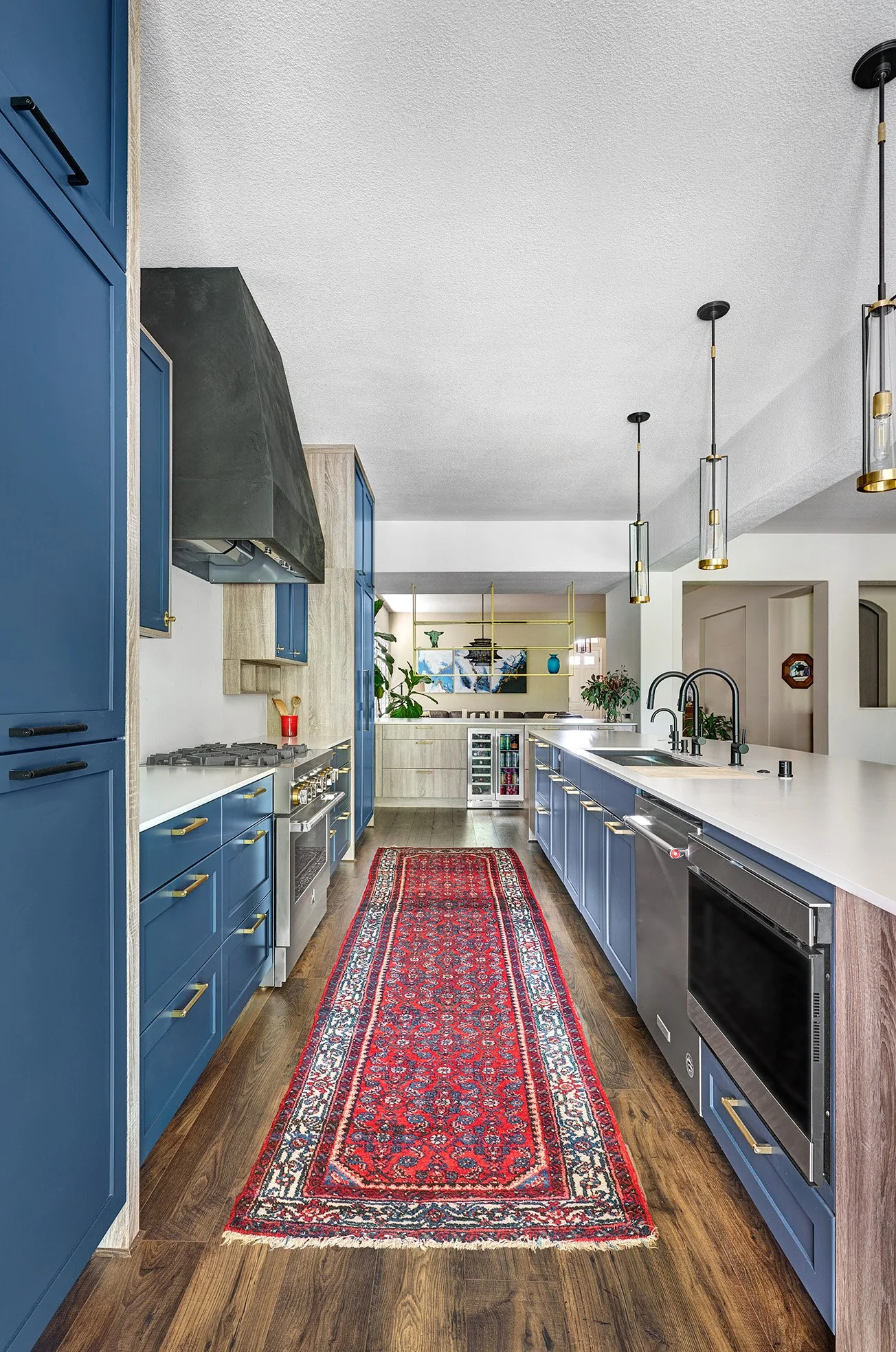 Kitchen remodel, blue + wood laminate cabinets, large seating island, appliance garage