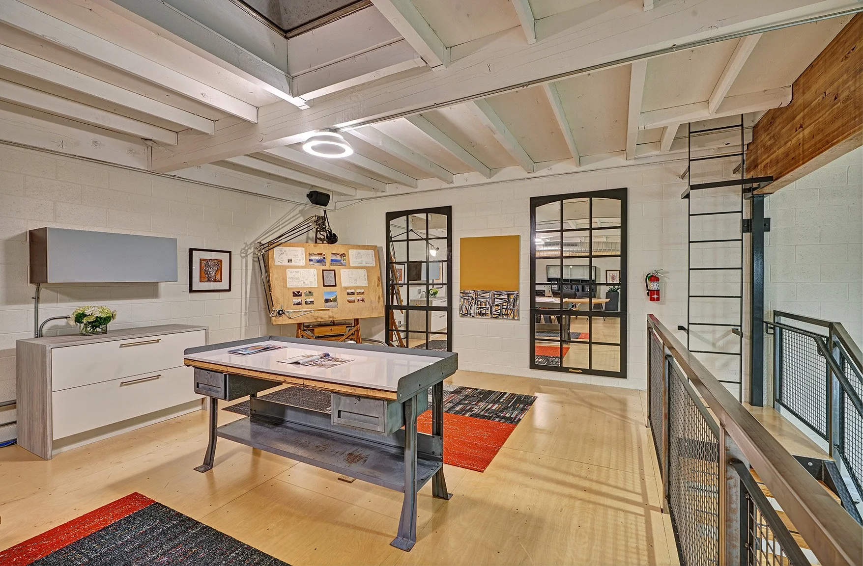 Interior design firm, mezzanine, desks, worksurfaces