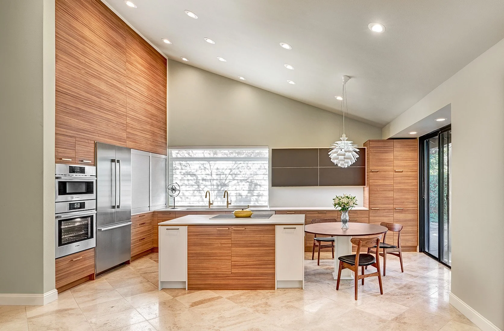 Vaulted ceiling kitchen remodel, wood European cabinetry, tall appliance wall, appliance garage, large island