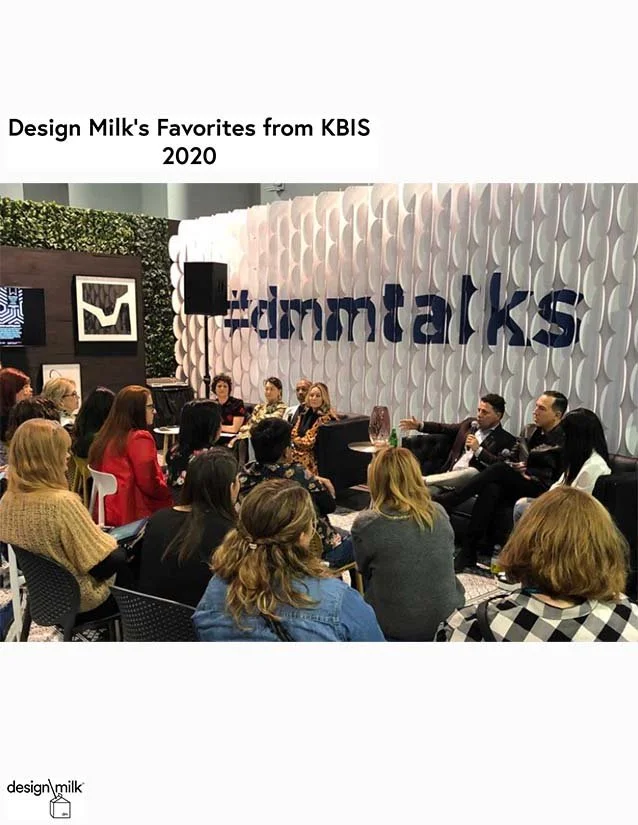 A panel of speakers at a Design Milk event discussing digital talks, with an audience seated and listening, in front of a decorative wall with the design milk logo.