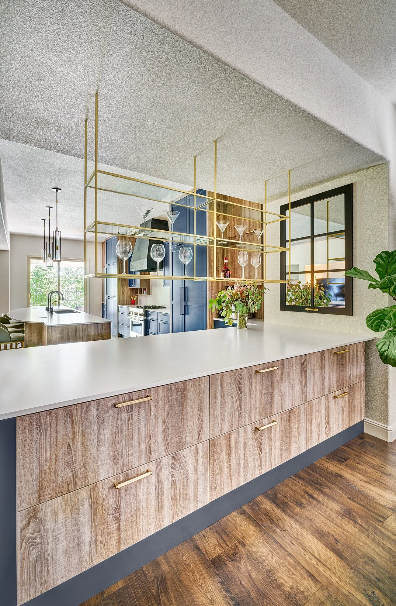 Kitchen remodel, blue + wood laminate cabinets, large seating island, appliance garage