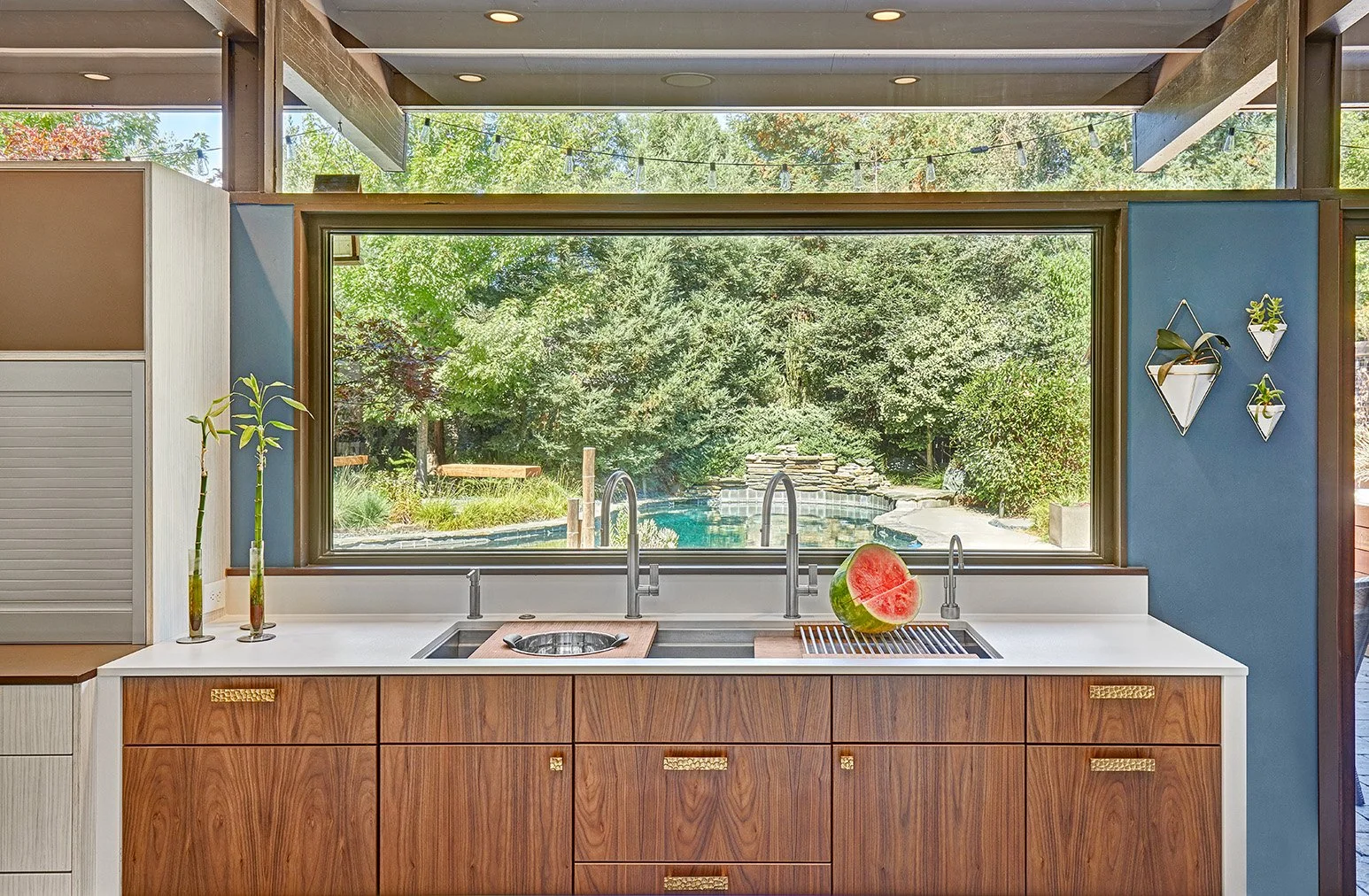 Mid-Century Modern kitchen remodel, Streng home, white + wood cabinetry, waterfall countertop, appliance garage, large island